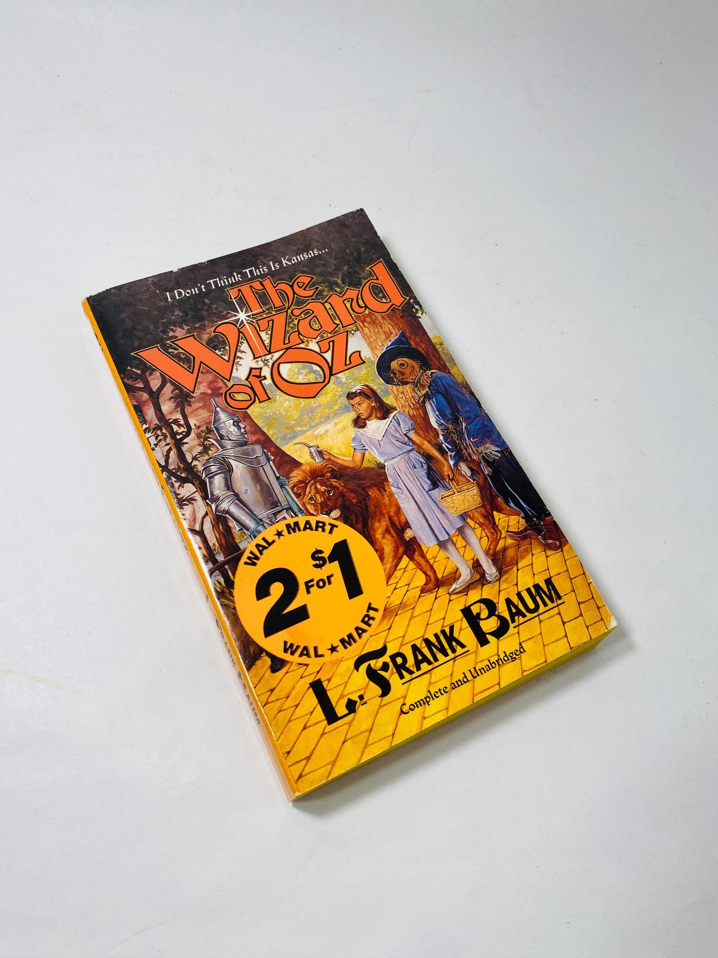 Wizard of Oz vintage paperback book by L Frank Baum circa 1988 Retro yellow decor stocking stuffer