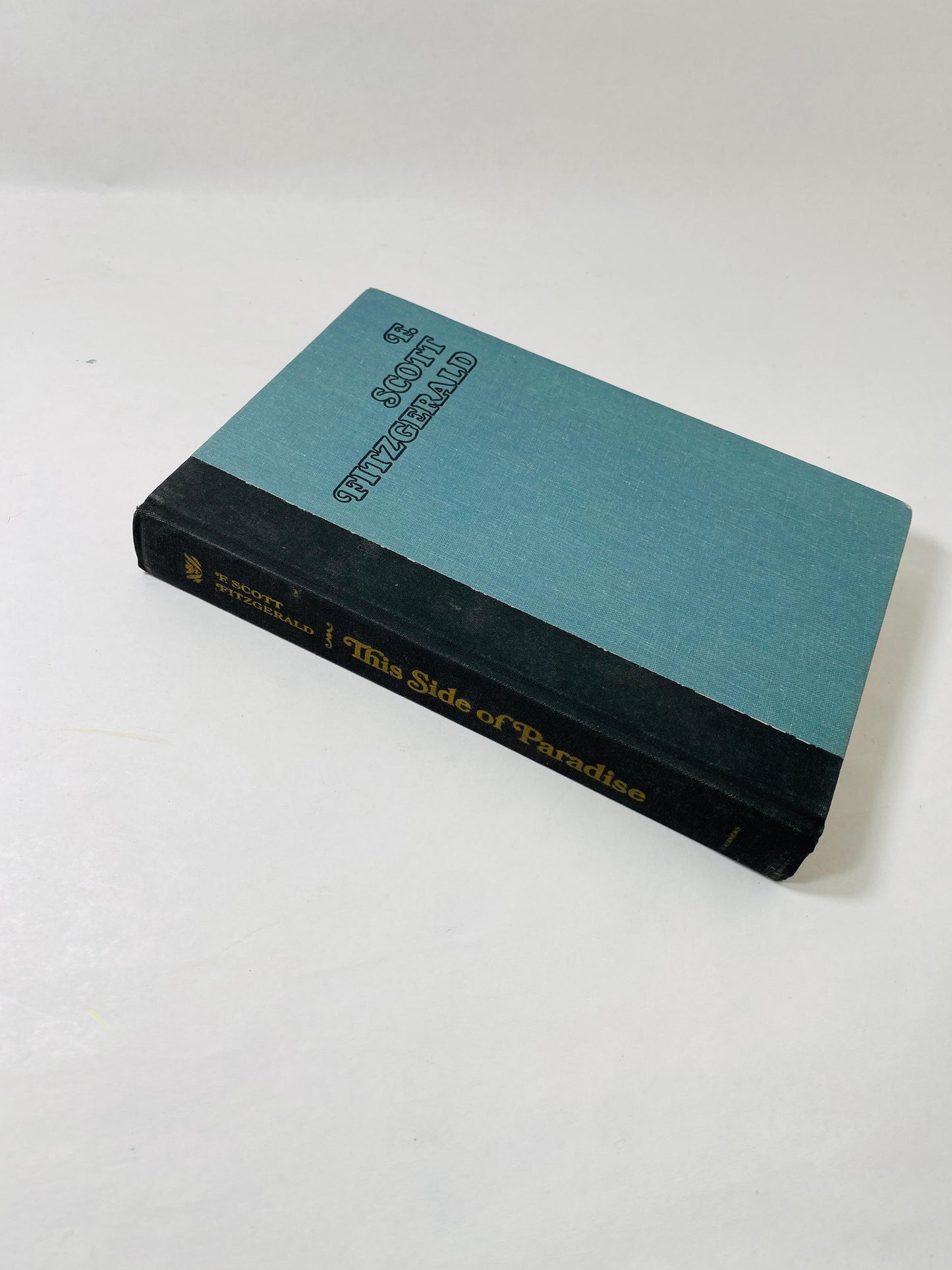 This Side of Paradise by F Scott Fitzgerald. Vintage semi-autobiographical book circa 1948. Debut novel about the lives of post WW I youth