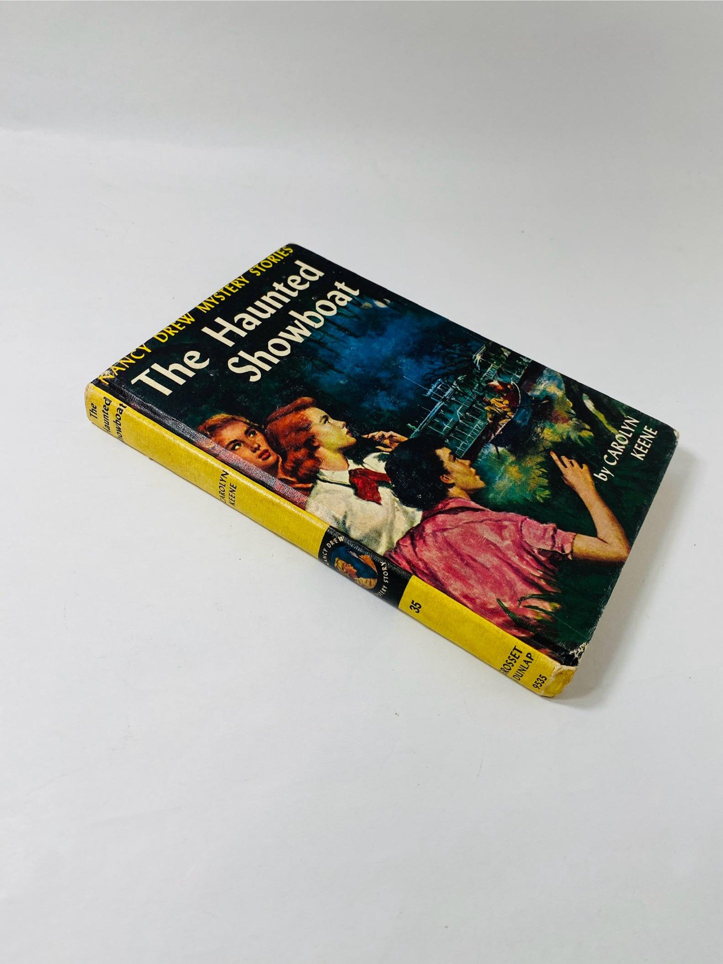 1957 Nancy Drew Mystery Stories Carolyn Keene Haunted Showboat Cue Tapping Heels Secret Old Clock Vintage books black & white endpapers