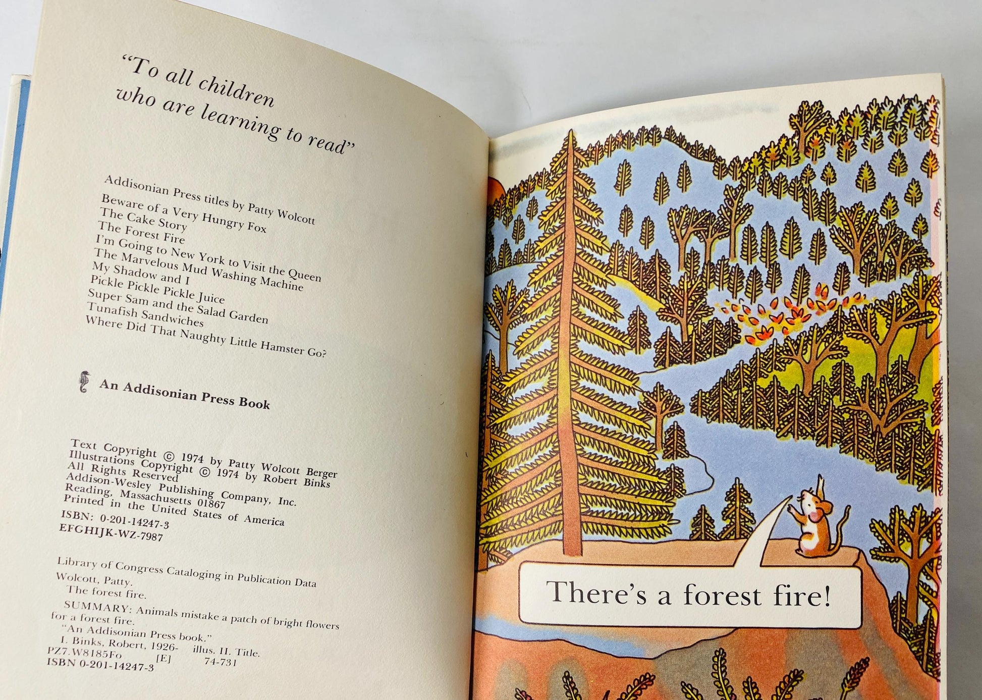 Forest Fire by Patty Wolcott Vintage children's book about animals who mistake a patch of bright flowers for a forest fire circa 1974.