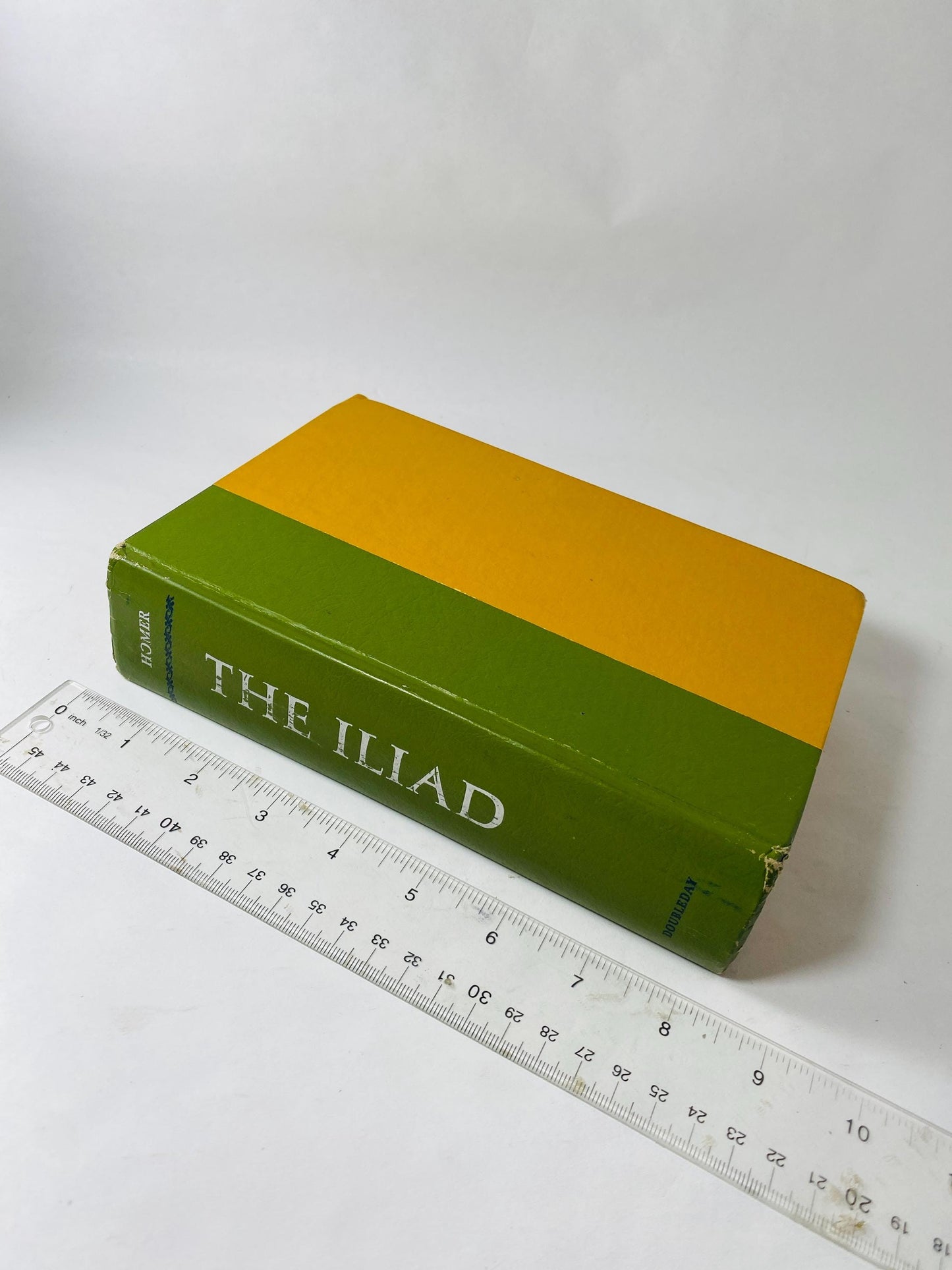 Homer The Iliad vintage book with orange and green boards Home bookshelf decor philosophy teen reading