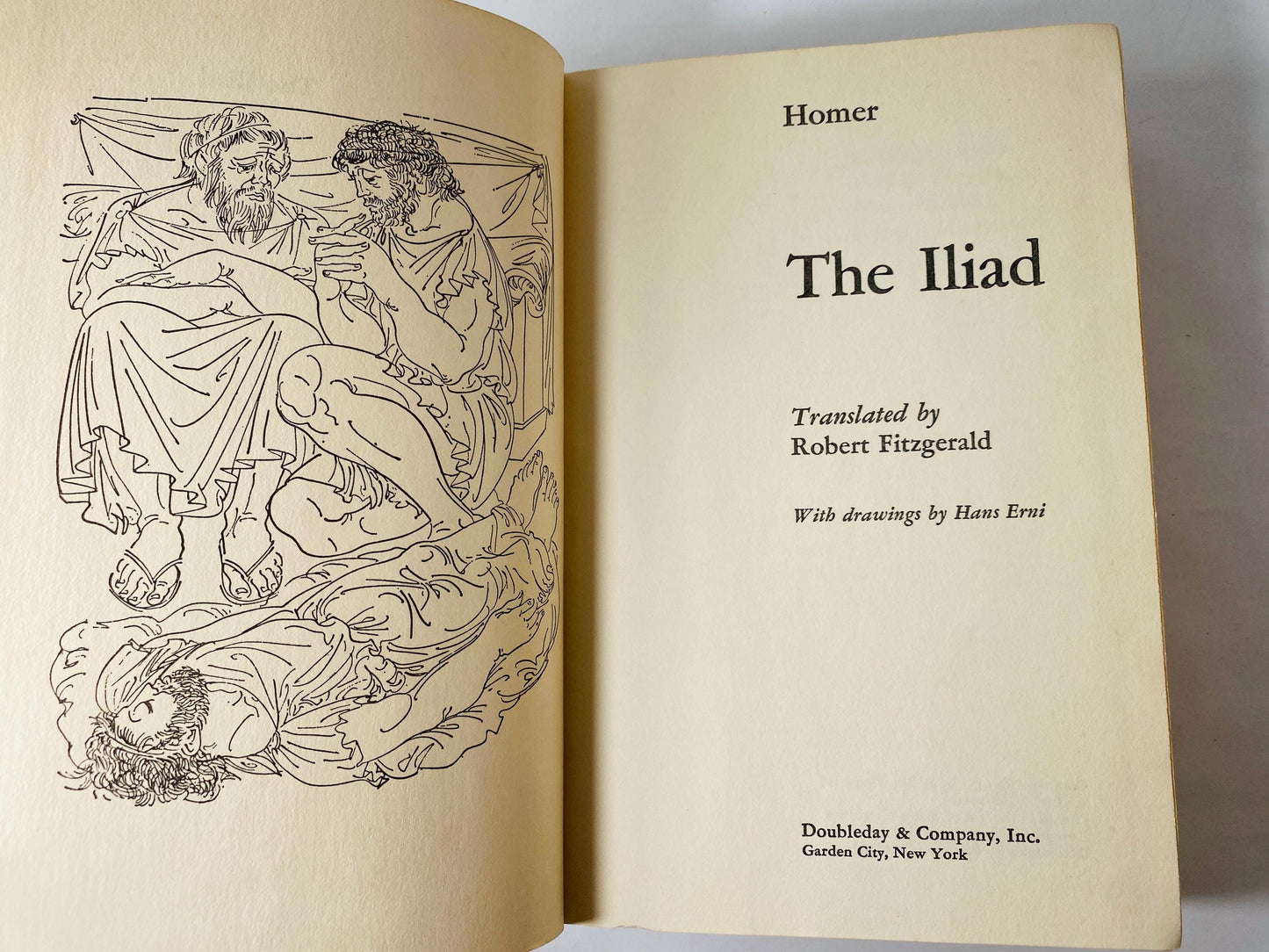 Homer The Iliad vintage book with orange and green boards Home bookshelf decor philosophy teen reading