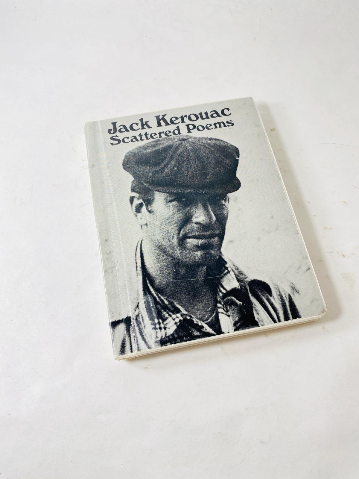 Scattered Poems vintage book by Jack Kerouac, a collection of his spontaneous poetry circa 1968