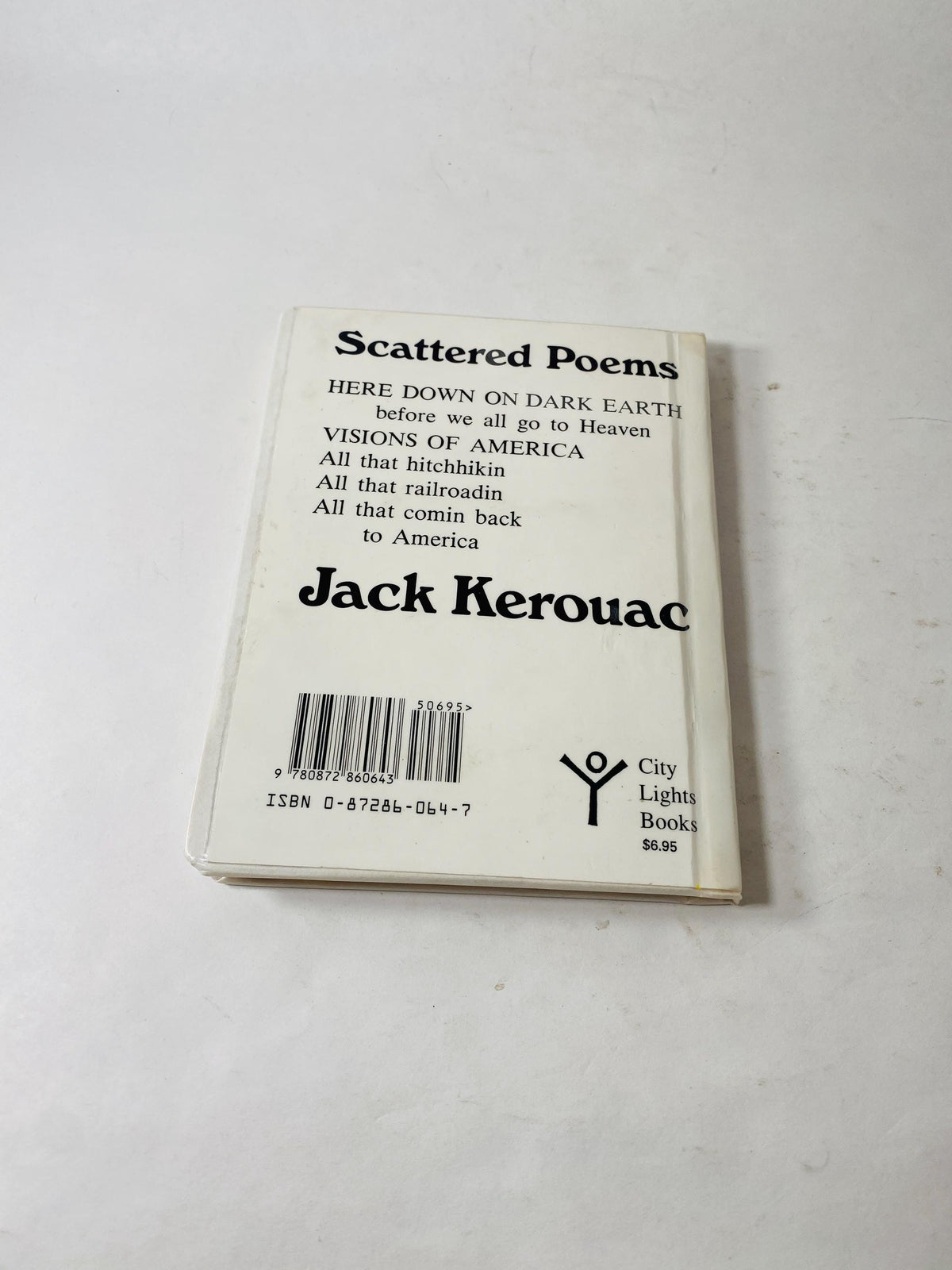 Scattered Poems vintage book by Jack Kerouac, a collection of his spontaneous poetry circa 1968