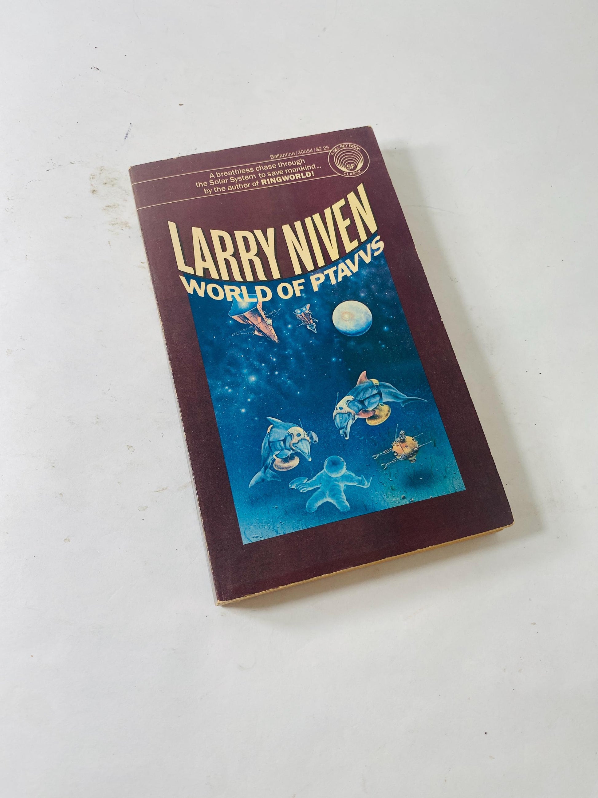 World of Ptavvs vintage paperback book by Larry Niven circa 1981 about telepathic skills and murderous organisms Science fiction scifi