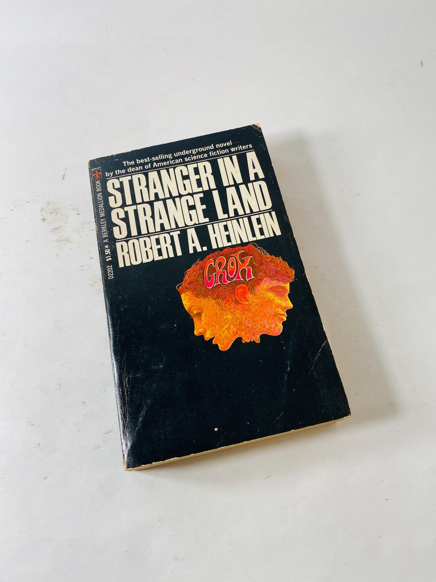 Stranger in a Strange Land by Robert Heinlein vintage paperback book featuring famous GROK artwork science fiction classic
