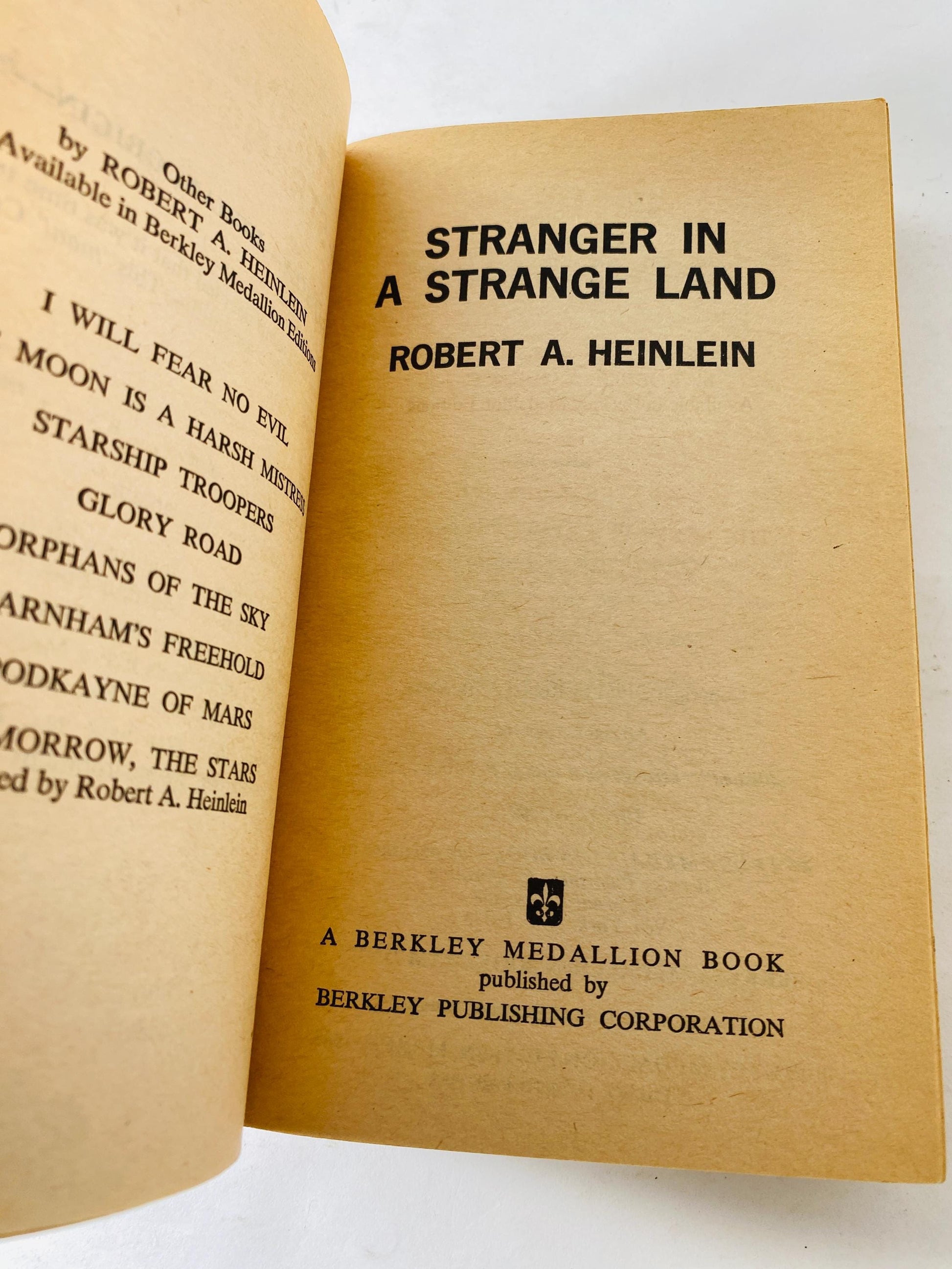 Stranger in a Strange Land by Robert Heinlein vintage paperback book featuring famous GROK artwork science fiction classic