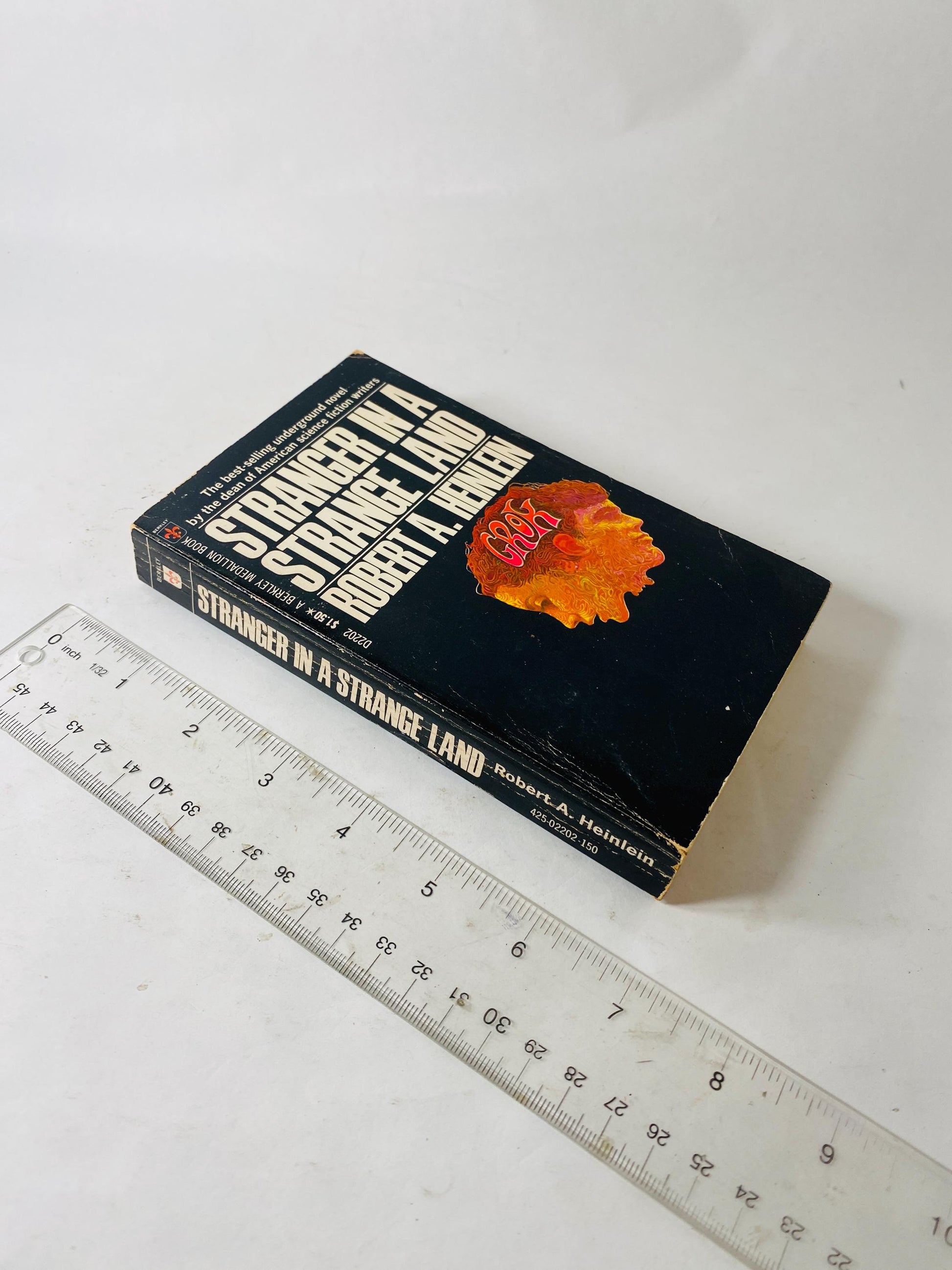 Stranger in a Strange Land by Robert Heinlein vintage paperback book featuring famous GROK artwork science fiction classic