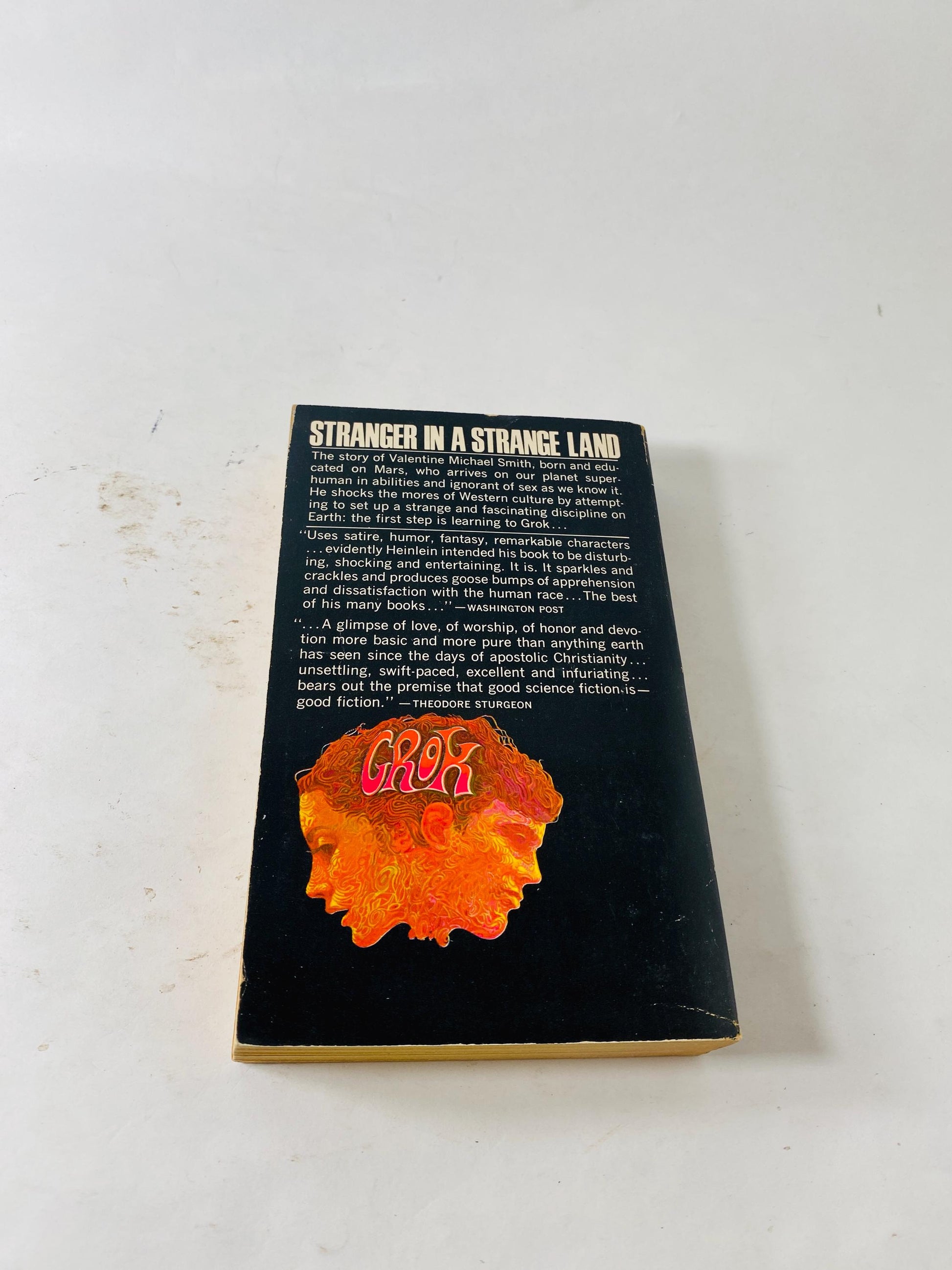Stranger in a Strange Land by Robert Heinlein vintage paperback book featuring famous GROK artwork science fiction classic