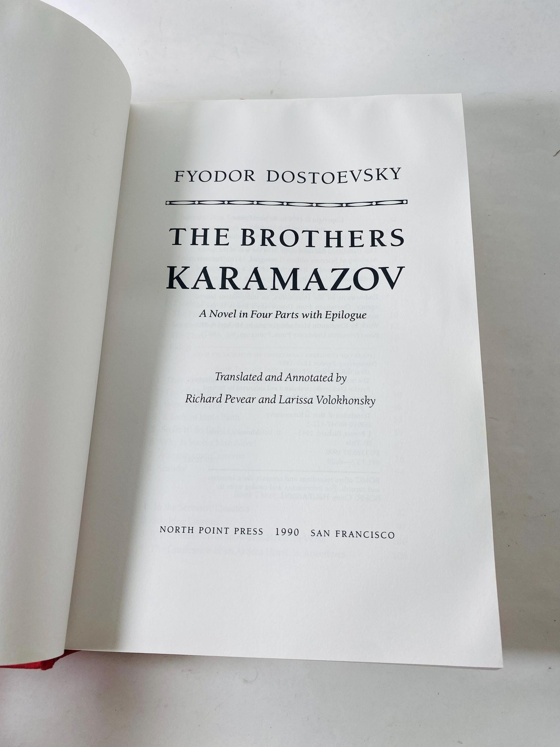 Brothers Karamazov by Fyodor Dostoevsky Vintage red leatherette book circa 1989. Examines ethics of God and free will. Rafael Palacios