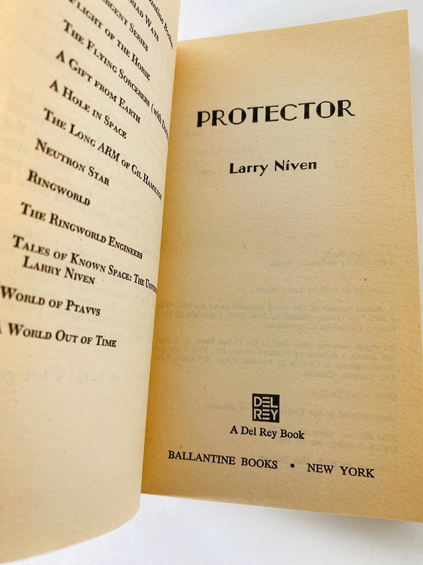 Protector vintage paperback book by Larry Niven circa 1981 about space warefare and saga of Brennan the Belter and Phssthpok the Pak scifi