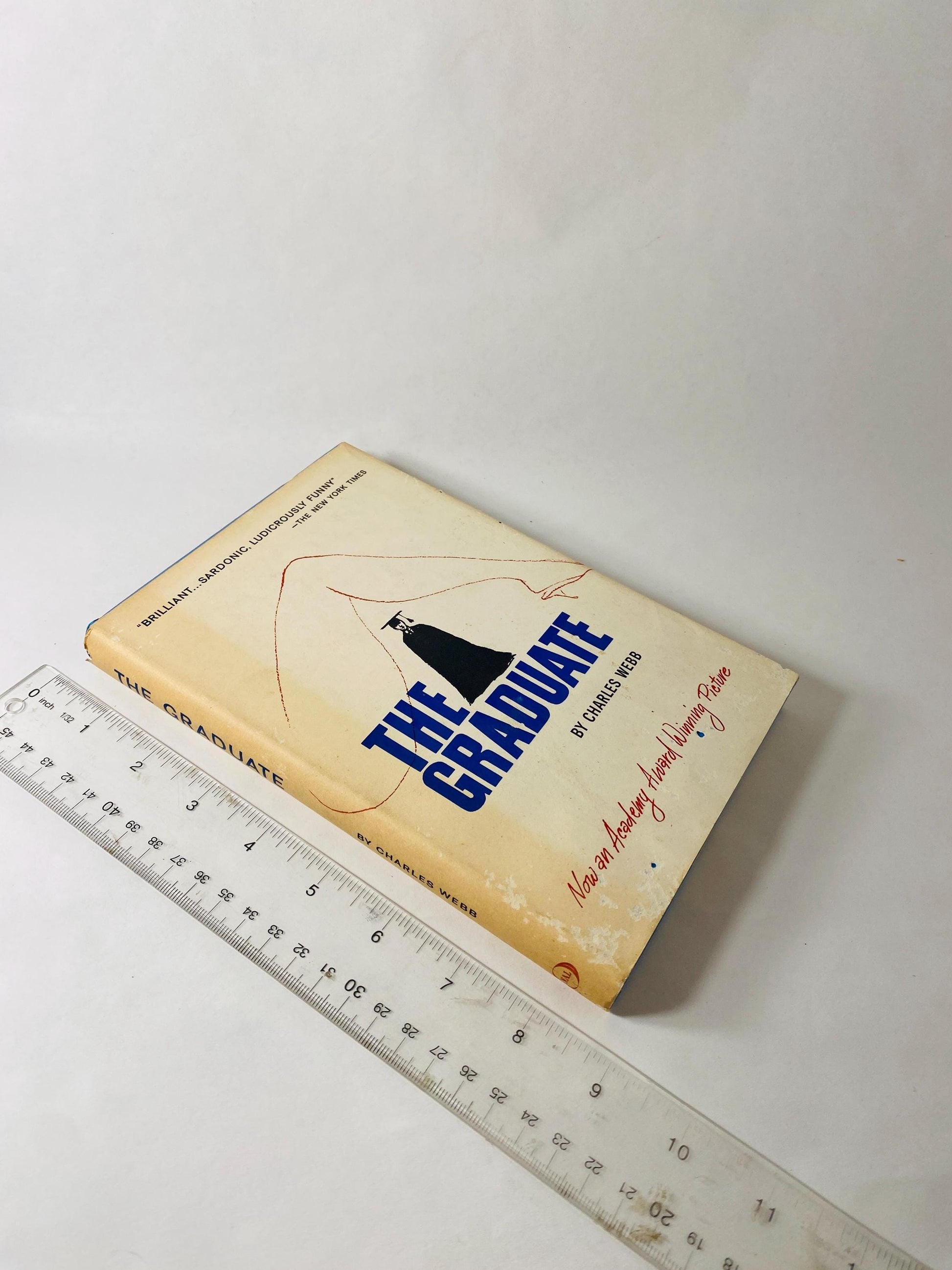 1963 The Graduate by Charles Webb vintage book about Benjamin's affair with Mrs. Robinson before falling in love with her daughter
