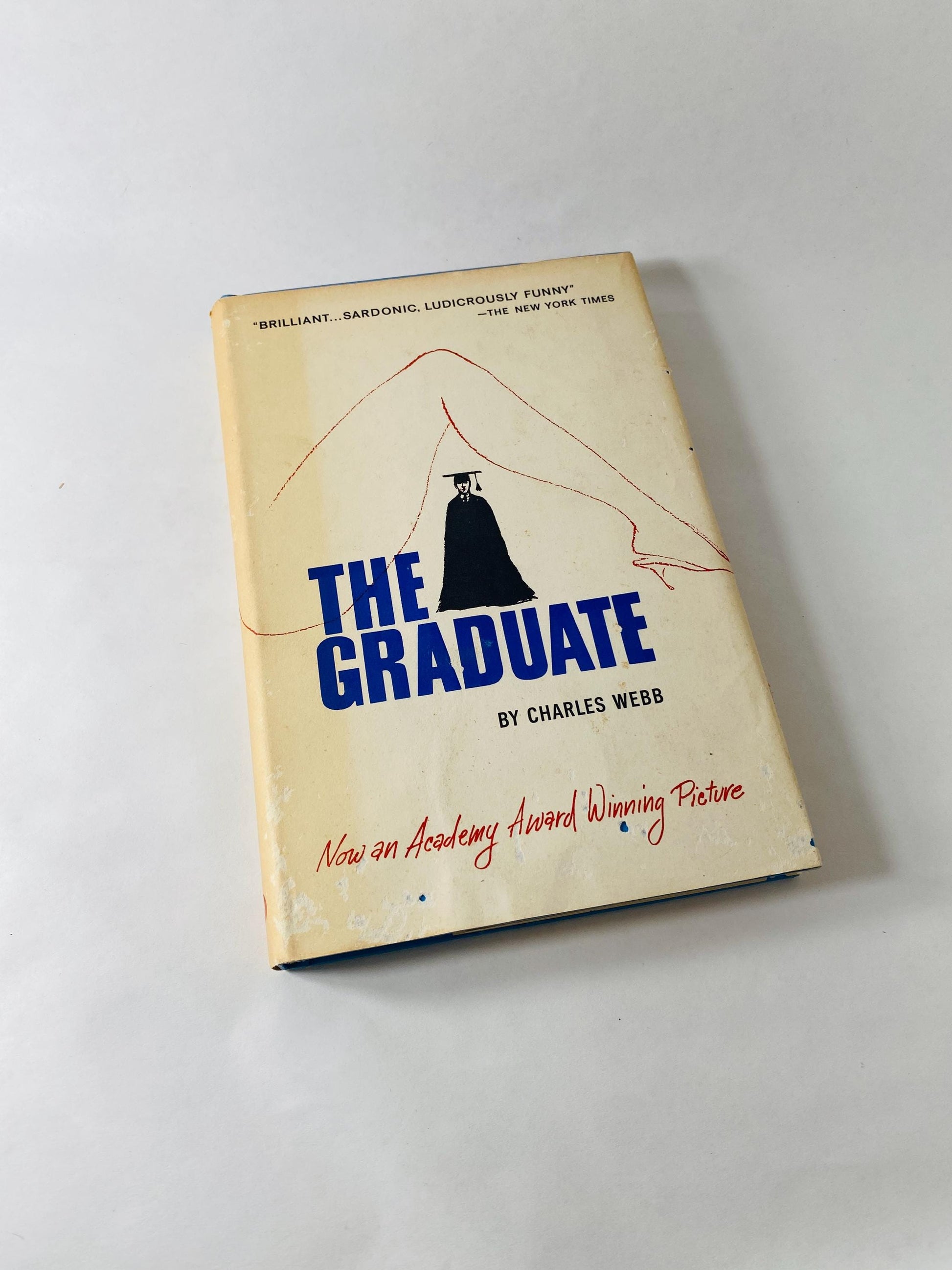 1963 The Graduate by Charles Webb vintage book about Benjamin's affair with Mrs. Robinson before falling in love with her daughter