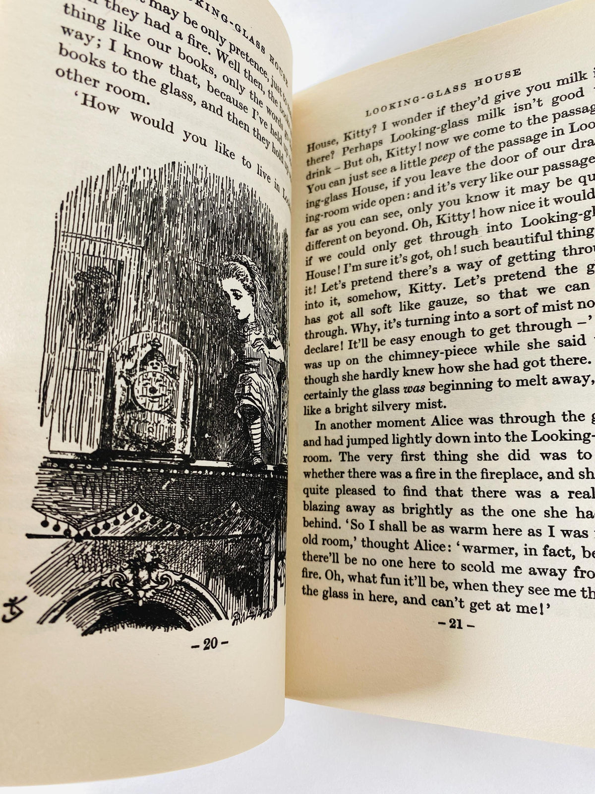 Alice in Wonderland Through the Looking Glass by Lewis Carroll vintage book circa 1976 paperback for little children.