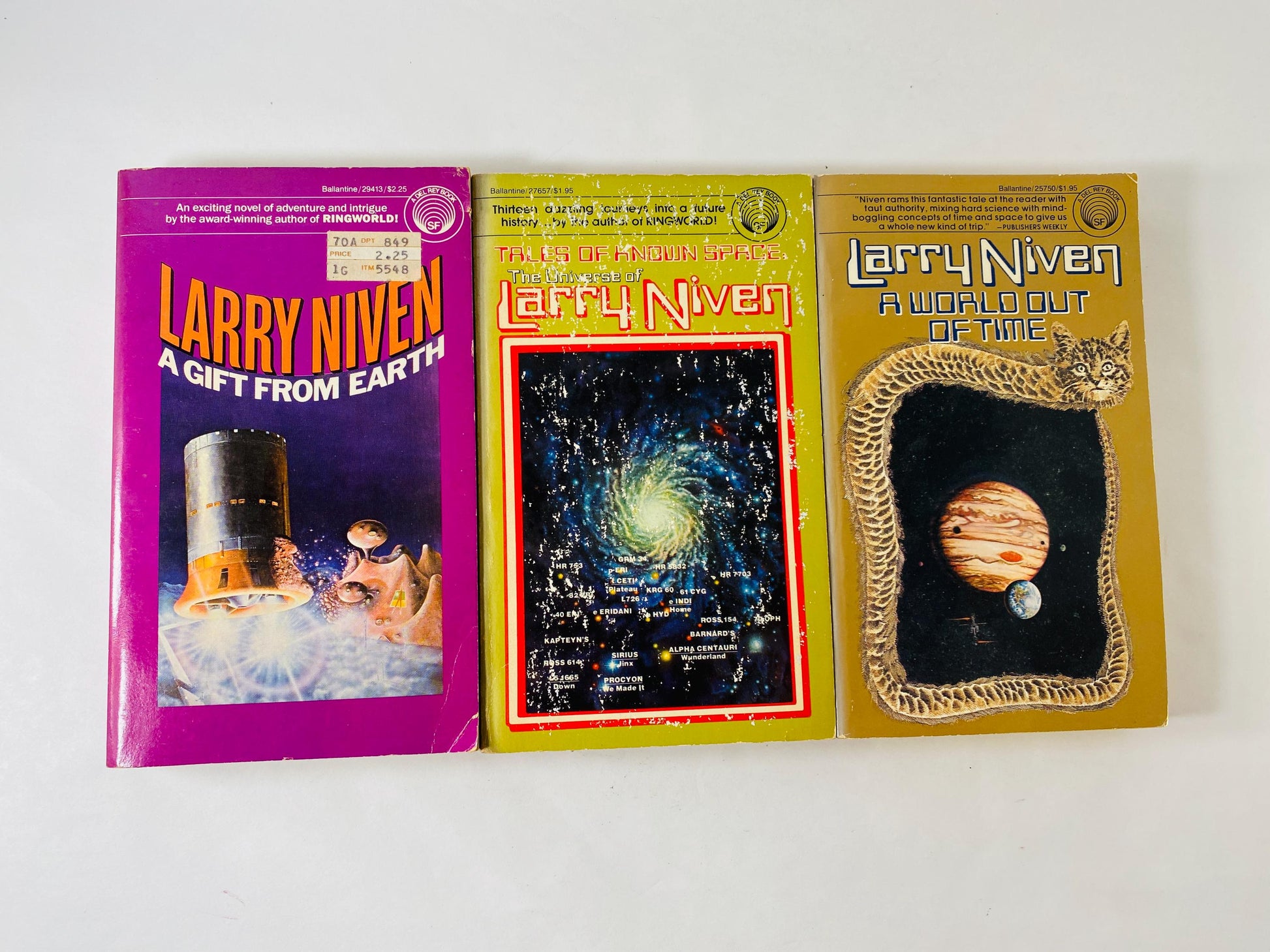 Vintage niche paperback book lot by Larry Niven set Known Space Tales, A Gift from Earth, A World Out of Time