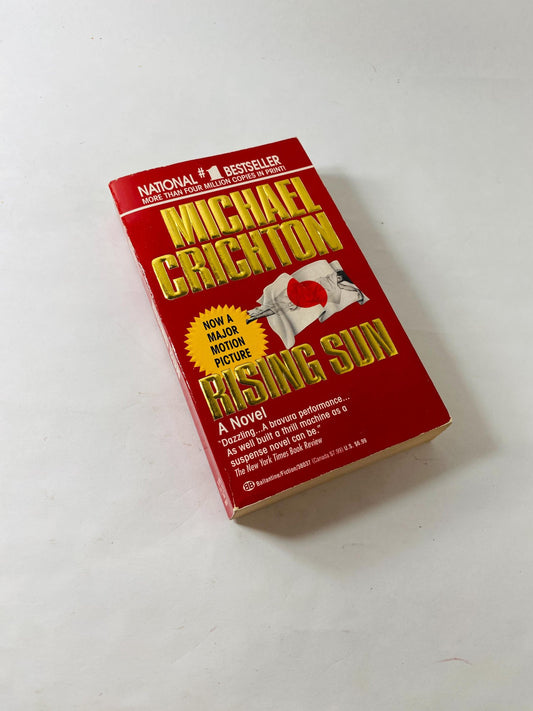 Rising Sun by Michael Crichton vintage paperback book circa 1992 set in Japan where business moguls compete for electronics industry