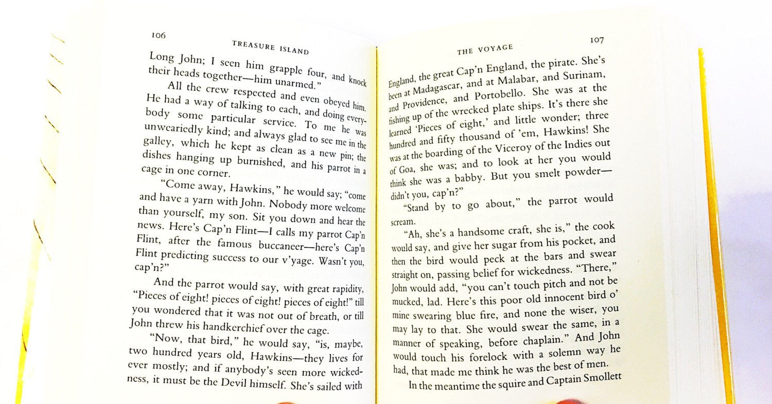 Vintage Treasure Island book by Robert Louis Stevenson. Coming-of-age story. Long John Silver. Pirates fiction