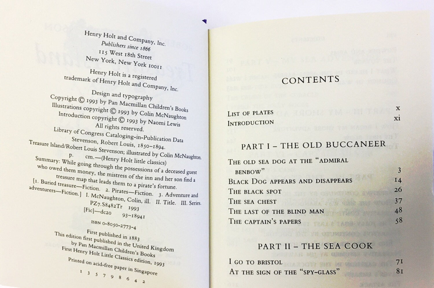 Vintage Treasure Island book by Robert Louis Stevenson. Coming-of-age story. Long John Silver. Pirates fiction