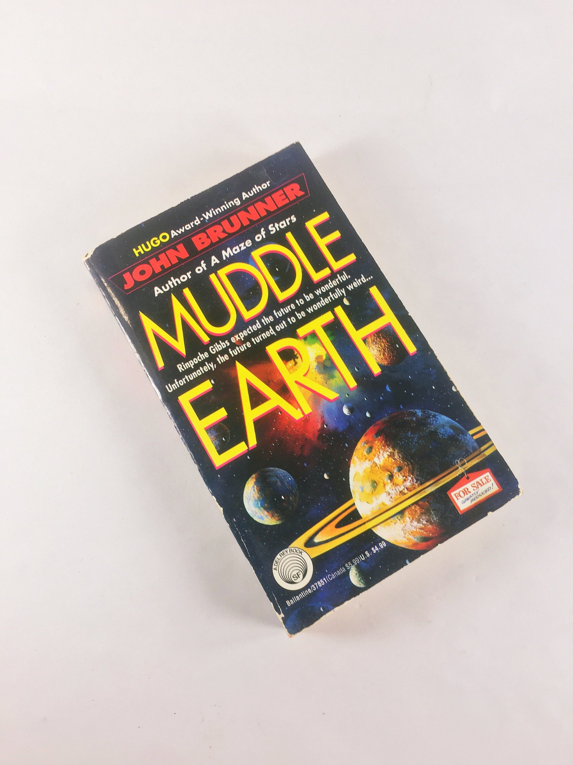 1993 Muddle Earth by John Brunner Science fiction book a man awakened from cryogenic suspension in the 24th century. Time Travel