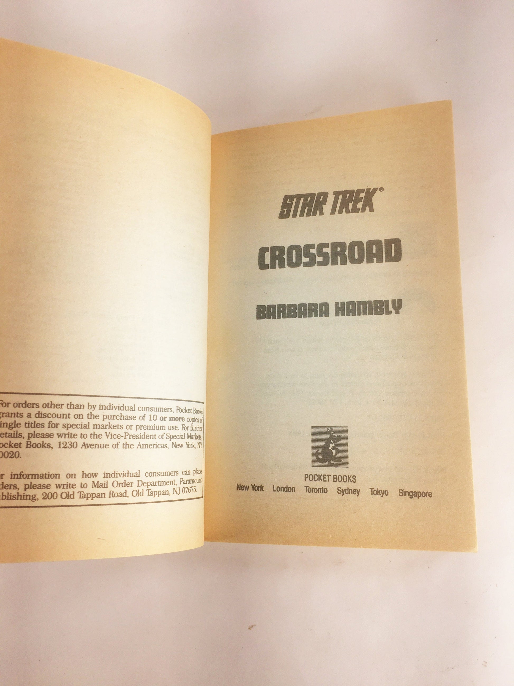 Star Trek Crossroad vintage paperback book by Barbara Hambly circa 1994. Pocket Books, Spock, Captain Kirk James Blish.
