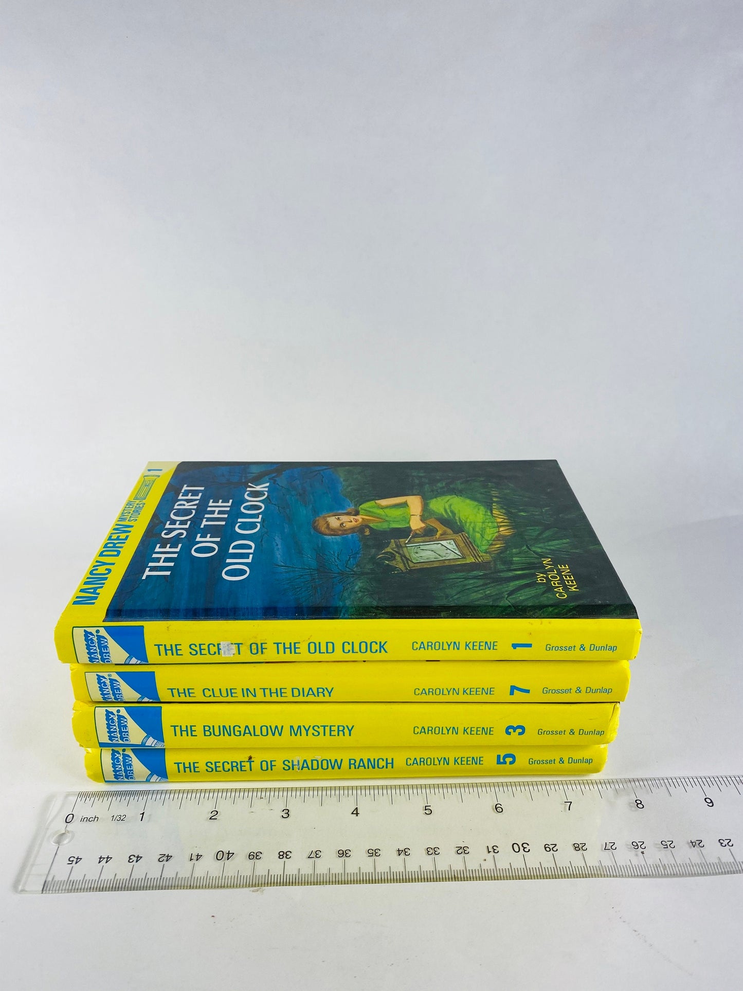 Nancy Drew Mystery Stories vintage books in good condition by Carolyn Keene. Glossy yellow spine hardcovers. home reading elementary middle