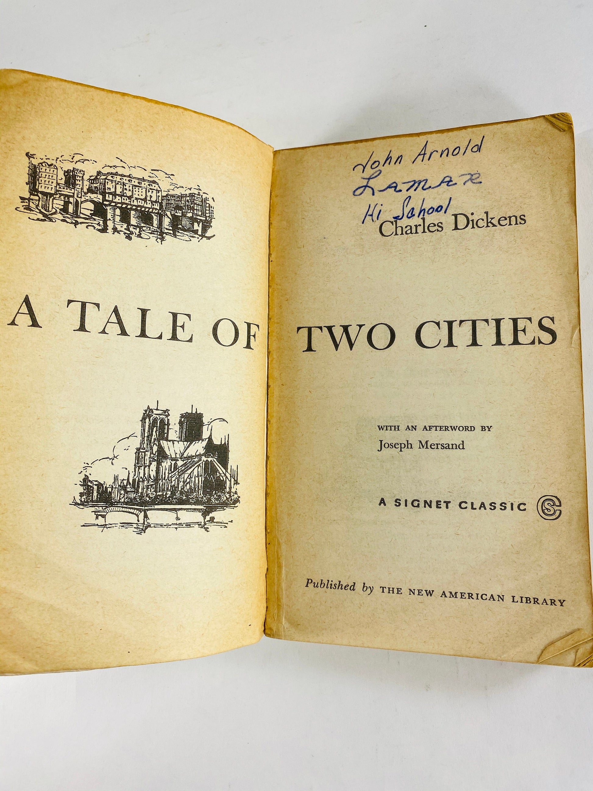 Charles Dickens Tale of Two Cities Vintage Signet paperback book circa 1962. White home decor prop staging. French Revolution.