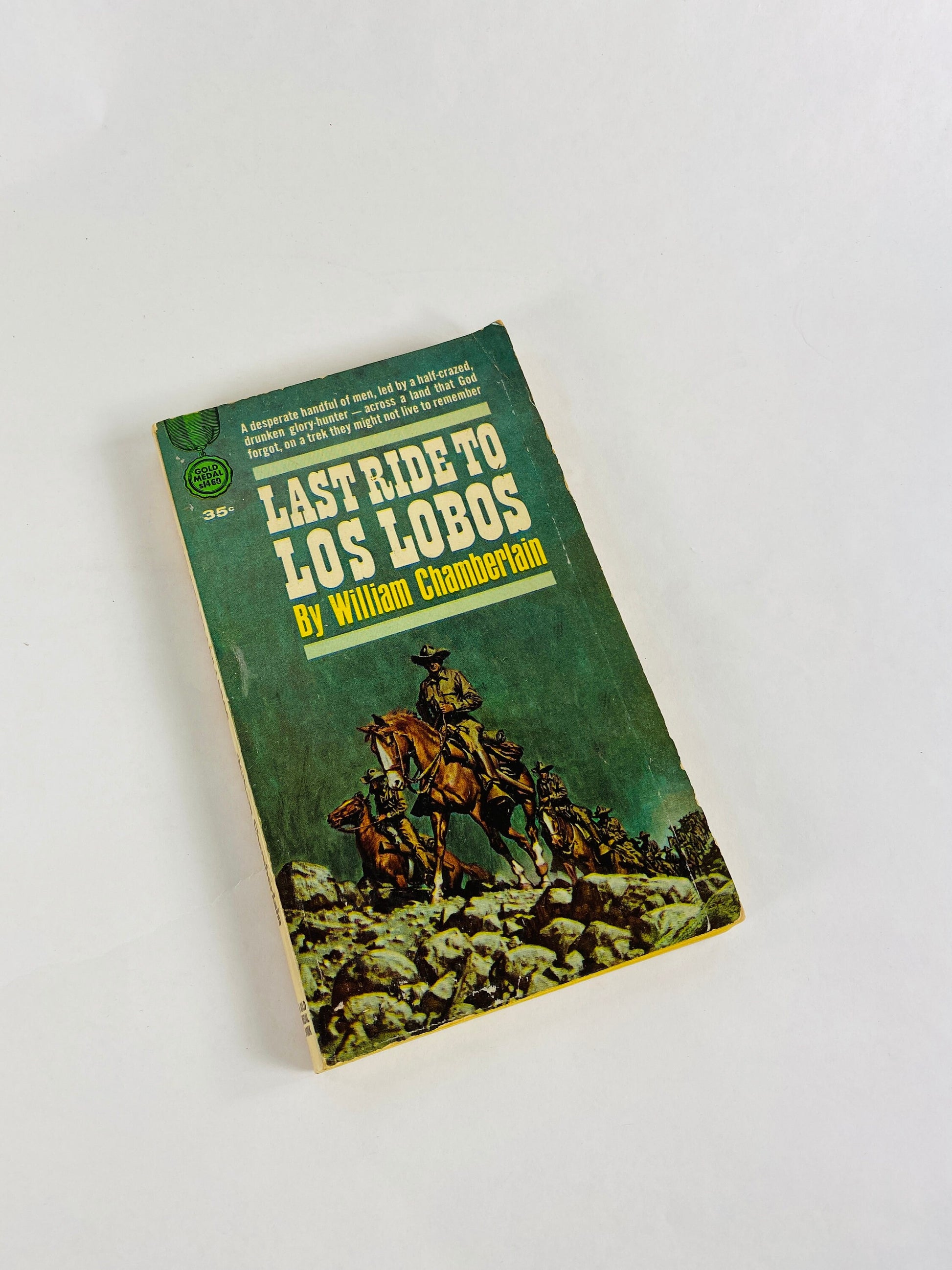 1964 Last Ride to Los Lobos Vintage Western paperback book by William Chamberlain about a man with an office job thrown on the frontier