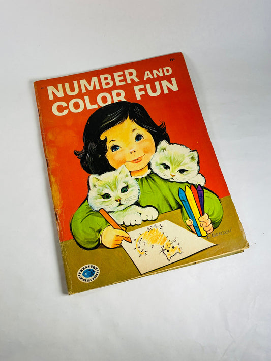 1953 Treasure Coloring Book. Vintage red activity book for children from the 1950s with some blank pages some colored. Missing Title Page