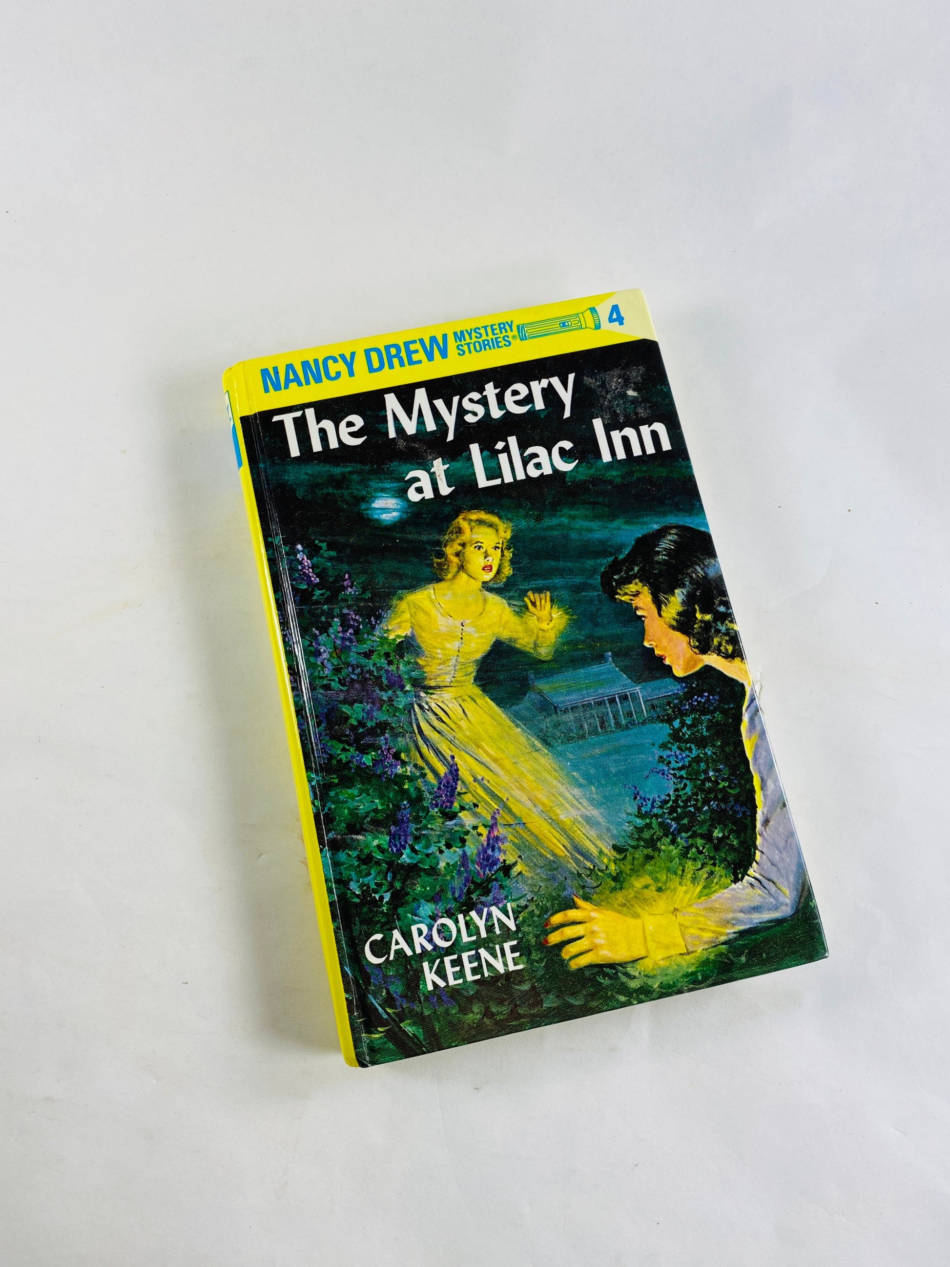 Nancy Drew Mystery Stories vintage books in good condition by Carolyn Keene. Glossy yellow spine hardcovers. home reading elementary middle