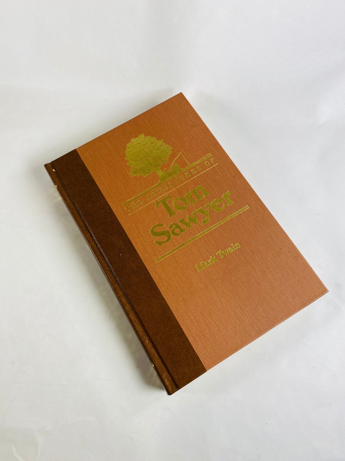 Adventures of Tom Sawyer by Samuel Clemens Mark Twain Vintage Reader's Digest book circa 1986. Brown & gold bookshelf decor