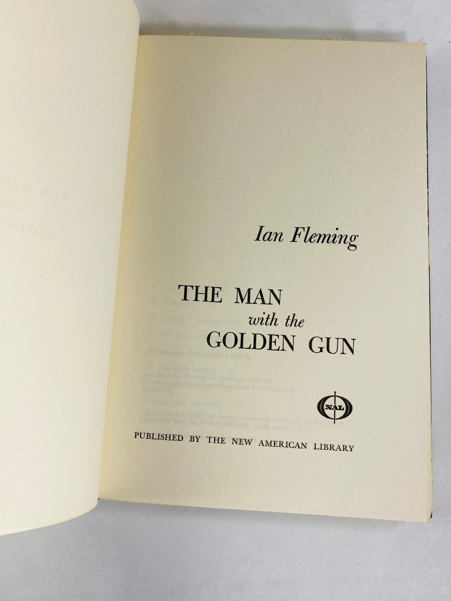 James Bond The Man with the Golden Gun vintage book by Ian Fleming EARLY PRINTING circa 1965 with dust jacket BCE