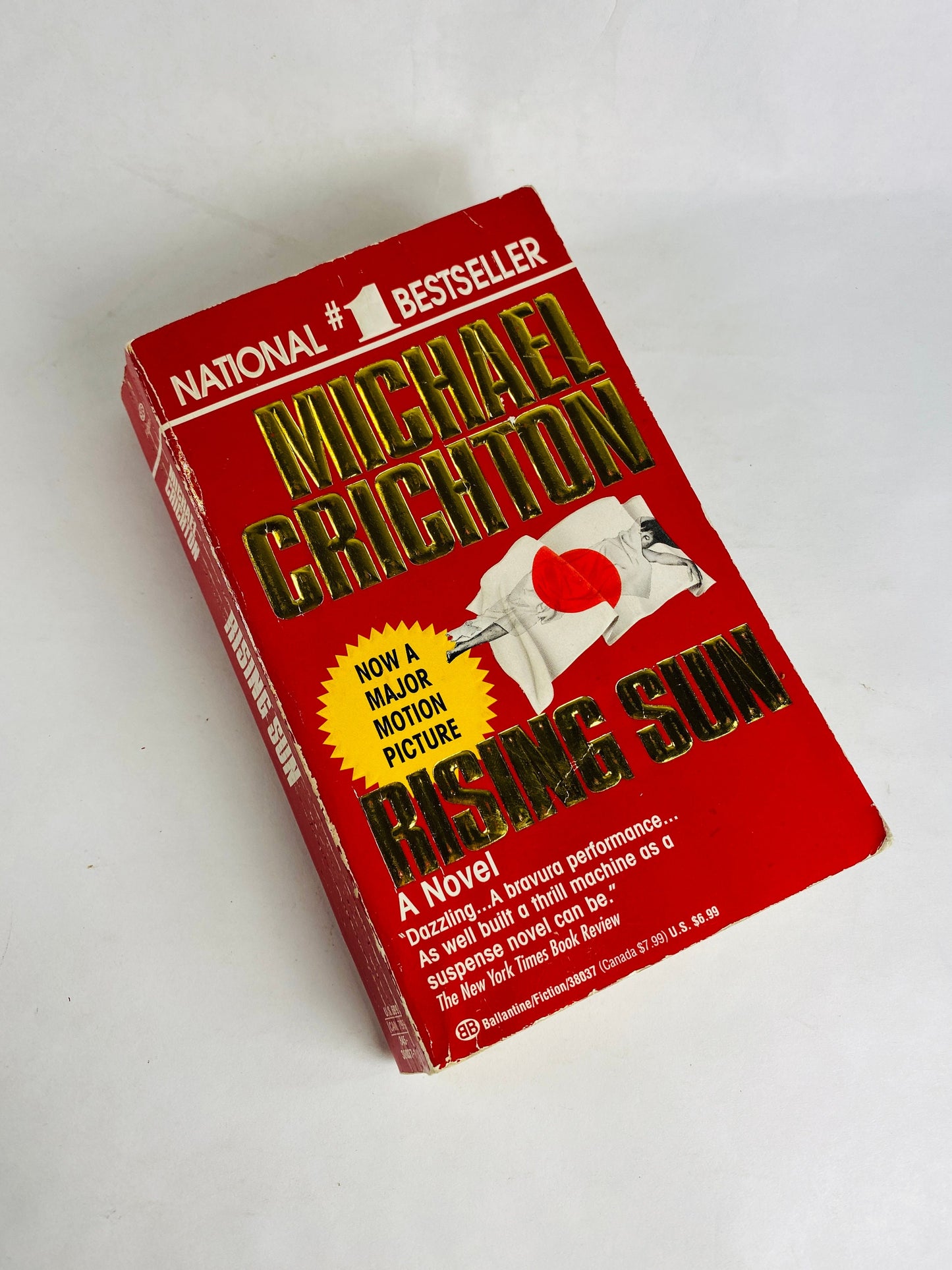 Rising Sun by Michael Crichton vintage paperback book circa 1992 set in Japan where business moguls compete for electronics industry