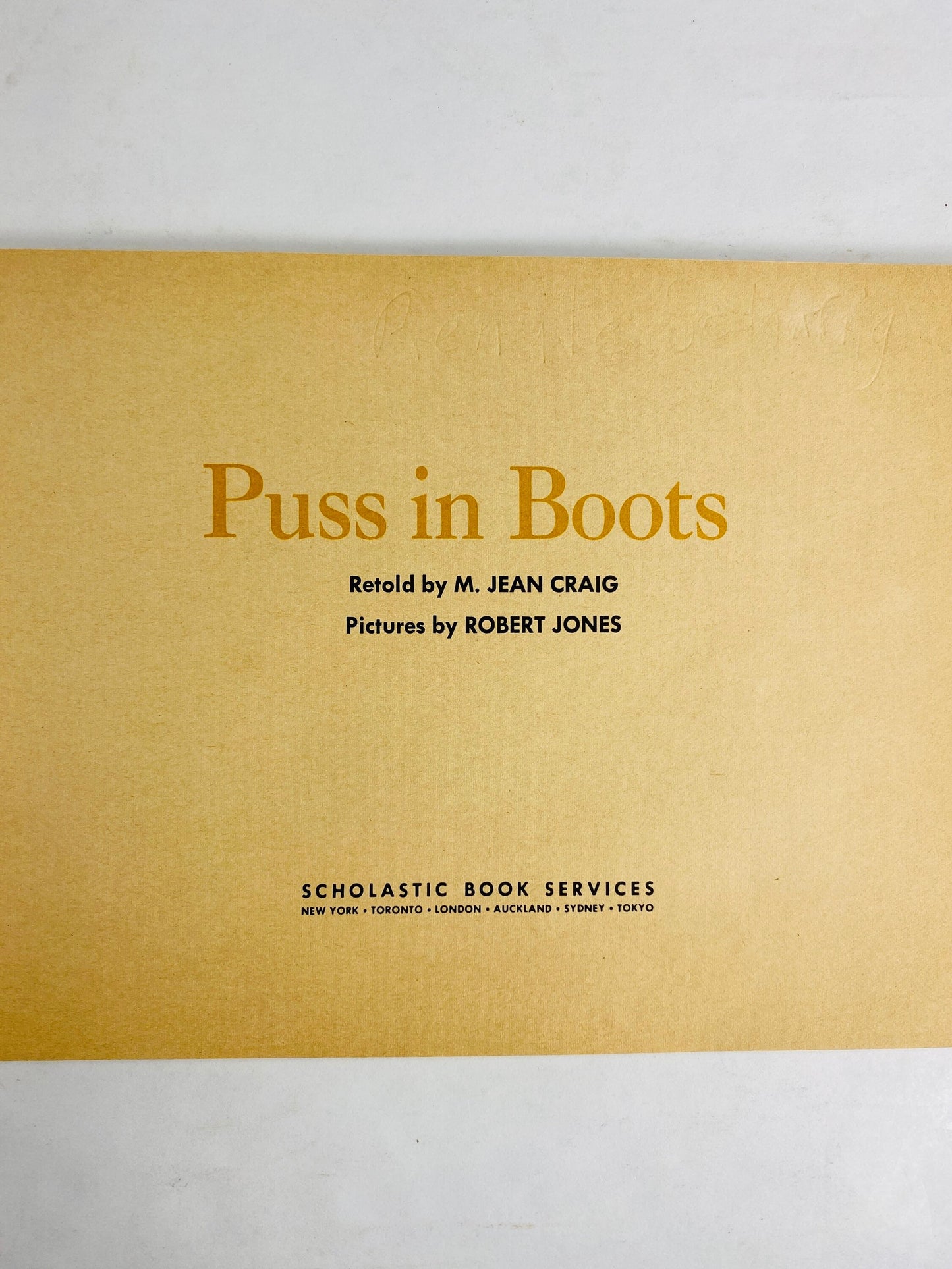 Puss in Boots circa 1972 Vintage children's book by M Jean Craig Scholastic paperback book Robert Jones illustrations.