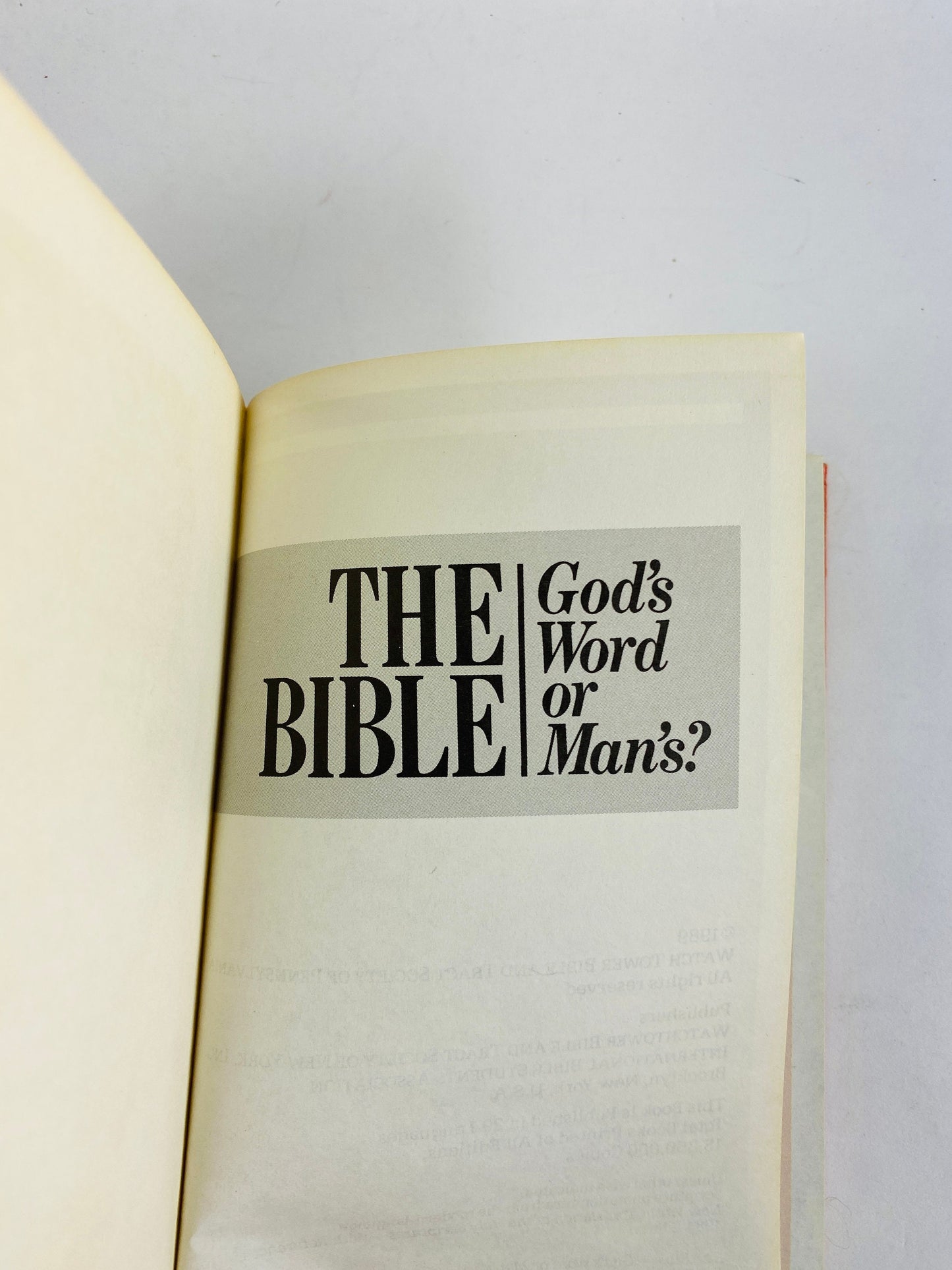 Bible vintage book God's Word or Man's small orange hardback book circa 1989 Provides textual content for studying the Scripture's subjects.