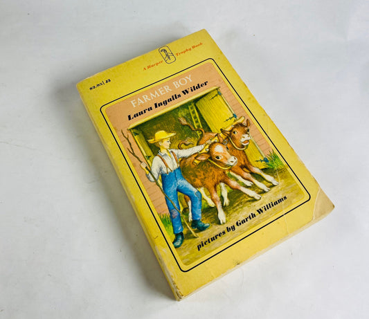 Farmer Boy vintage paperback book circa 1971 by Laura Ingalls Wilder part of Little House on the Prairie series.