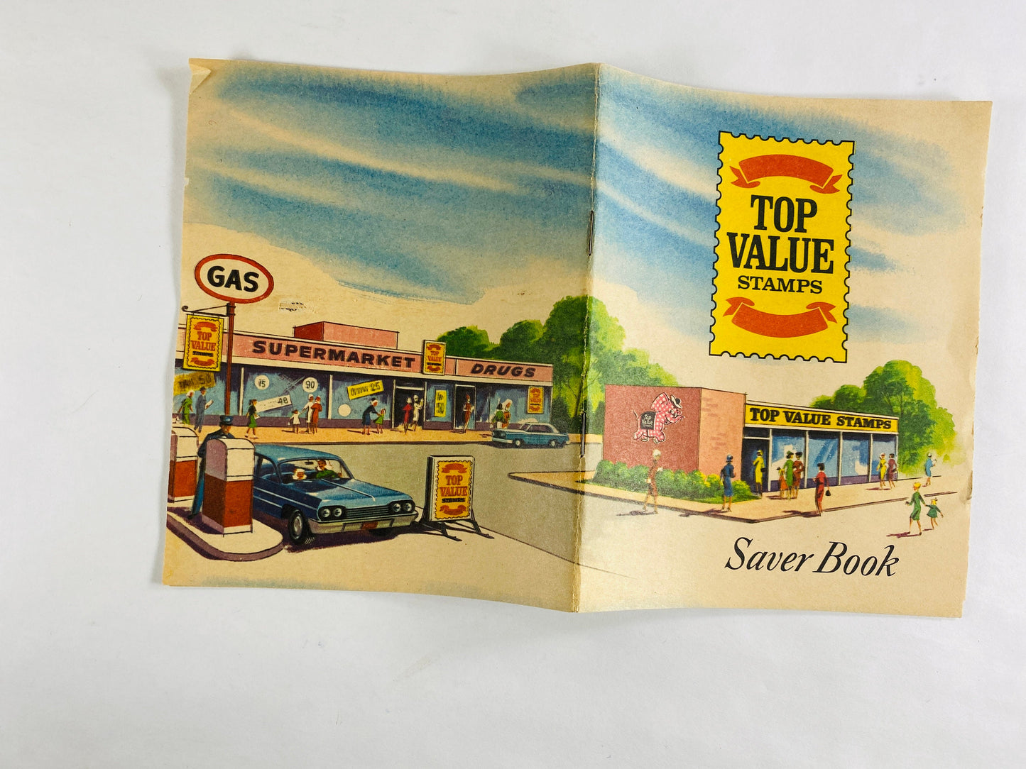 Authentic Top Value Green Stamps Saver booklet with pasted stamps by Top Saver circa 1966. Grocery Store coupons 1960s prop staging decor