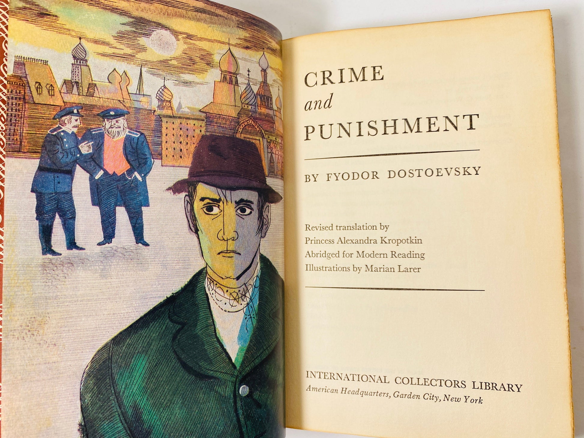 Crime and Punishment by Fyodor Dostoevsky Vintage International Collectors Library book in Czar Alexander binding. Red cover & gold inlay
