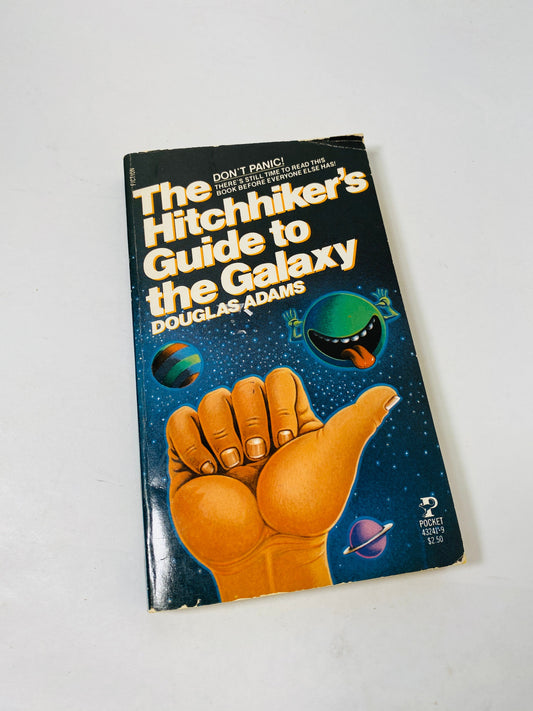 Hitchhiker's Guide to the Galaxy. Vintage Douglas Adams paperback book circa 1981. FIRST POCKET printing.