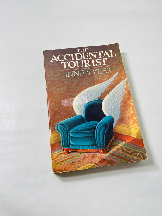 1985 Accidental Tourist vintage paperback book by Anne Tyler about mourning a murdered son and a marriage lost in grief